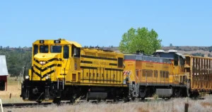 Yellow locomotives in the countryside